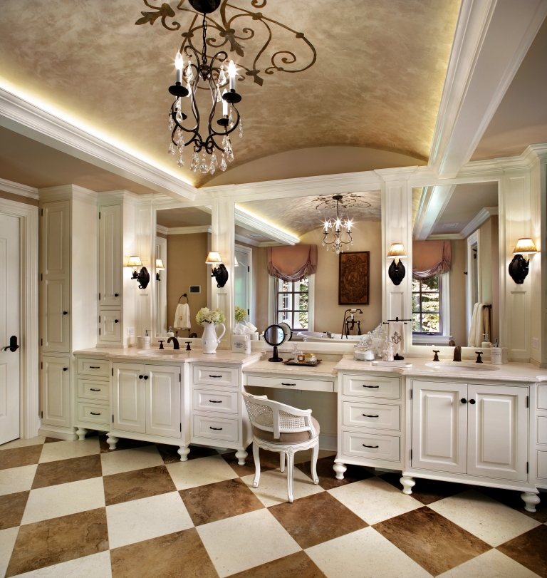 Our latest custom bathroom design features painted cabinetry and an open floor plan.